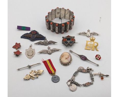 A selection of silver white metal and other jewellery to include RAF sweetheart brooches, a Chinese silver and coral bracelet
