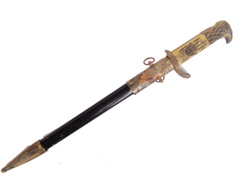 A German Police military parade dagger. Eagle headed grips, with police swastika lozenge to the handle. The blade marked for 