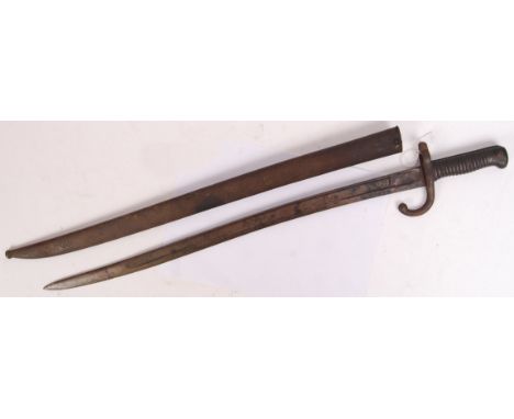 An original antique likely French artillery rifle bayonet along with its original scabbard. Measures approx 71cm long.  