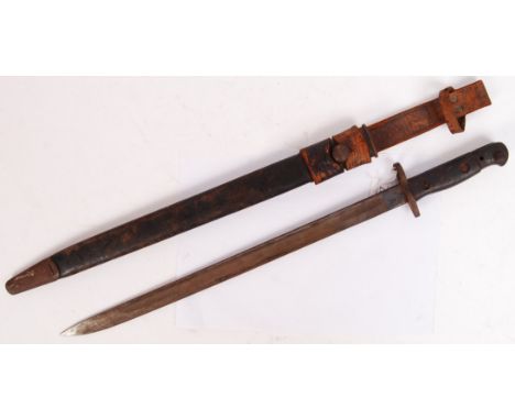 An antique early 20th century 1907 pattern British artillery rifle bayonet within its original scabbard. Measures approx 59cm