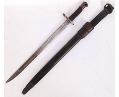 An original British Remington First World War WWI 1913 pattern bayonet within its original scabbard. Measures approx 59cm lon