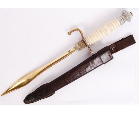 An unusual 20th century German brass dagger with white swirled carved handled dagger within leather scabbard. Measures approx