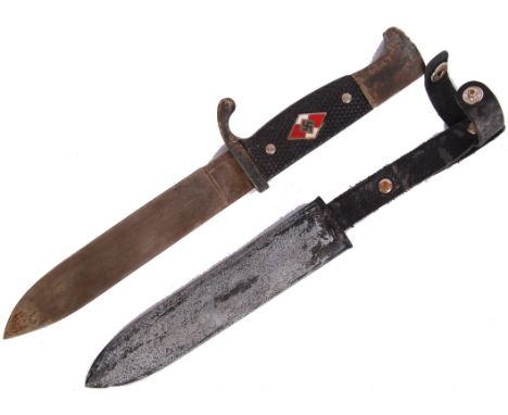 A 20th century German Hitler Youth style dagger. Enamelled lozenge to handle, with swastika emblem. The grips stamped RZM39. 