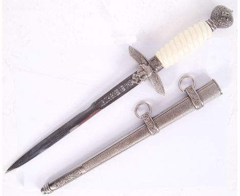 A 20th century reproduction Nazi Germany Third Reich 2nd pattern faux bone handled Luftwaffe Ceremonial Dagger with swastika 