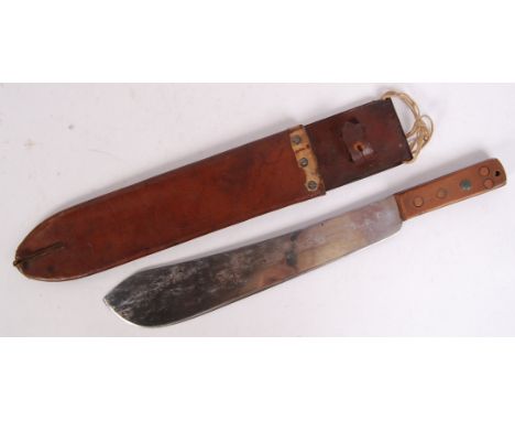 An original WWII Second World War issue military Martindale made Machete. The blade displaying the Martindale Crocodile mark,