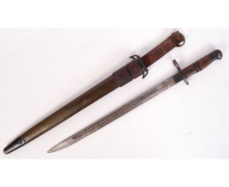 A good original WWI First World War British infantry 1913 pattern rifle bayonet. Wooden grips, with the blade marked Remingto