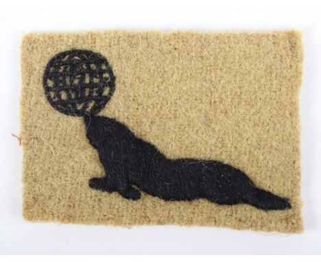 Rare 1st Pattern 12th Army HQ / Force 545 Cloth Formation Sign, being a black embroidered seal balancing a globe on his nose,