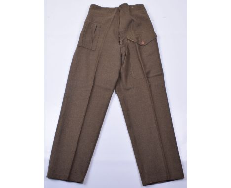 1945 Battle Dress Trousers, late war quality made khaki wool trousers with wooden buttons. Large thigh pocket and hip pocket.