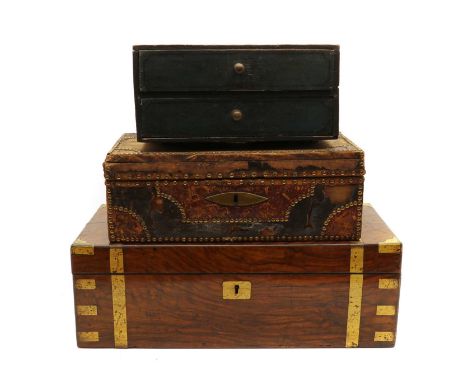 A Victorian walnut writing box,with brass banding, with a leather writing surface, and secret compartment containing letters,