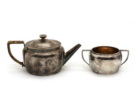 A silver-plated teapot,designed by Dr Christopher Dresser for Hukin and Heath, stamped marks 'designed by Dr C Dresser 2109 a