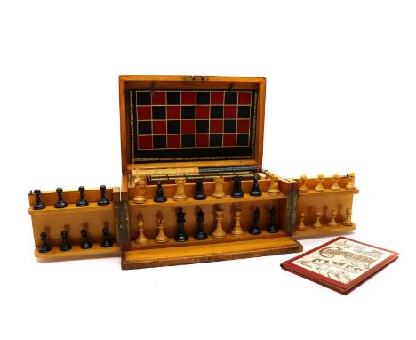 An Edwardian games compendium, the pine box with brass fittings, opening to reveal a multi-game tooled leather board to rever