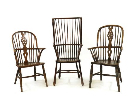 A Liberty &amp; Co style stick-back Windsor chair,early 20th century, with a rounded back and dished seat, over turned suppor