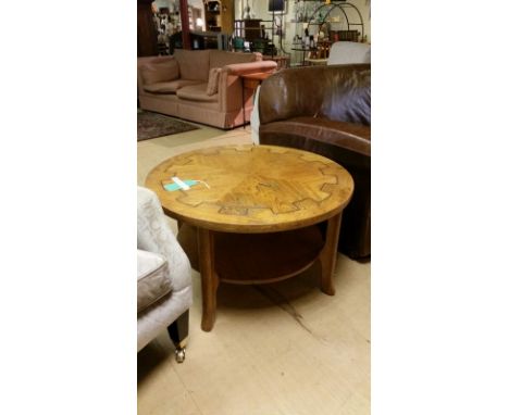 Circular vintage oak table with geometric design and useful undershelf - 86cm diameter, 52 cm highNOTE: This is in external s