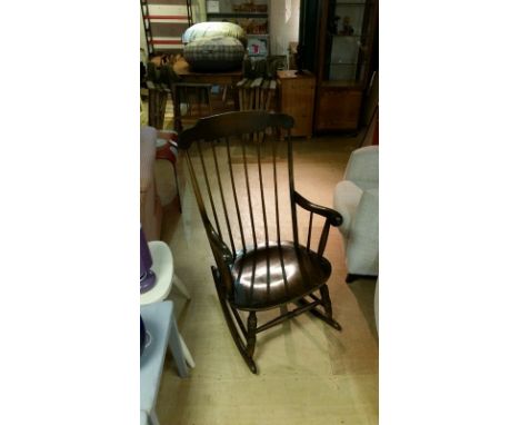 Vintage rocking chair, bearing label for the Stol, Kamnik - Yugoslavia - factory, stained wood (possibly beech). Some wear to