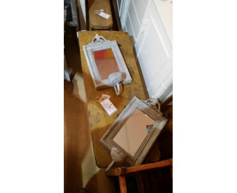 Pair of mirrors suitable for garden use, small metal sconce to front, shabby chic distressed look. Each measures approx 52 cm
