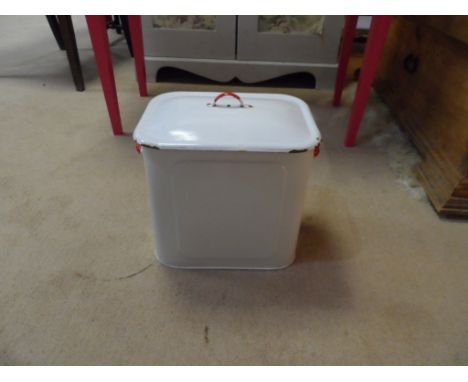Vintage enamel breadbin. White with red trim. Some damage to enamel around lid. measures approx: 33cm wide, 30cm high, 25cm d