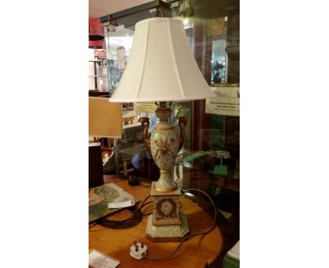 Decorative side lamp. French inspired base, decorative gold swag detail. Neutral cream shade.  Measures approx: 77cm high, PA