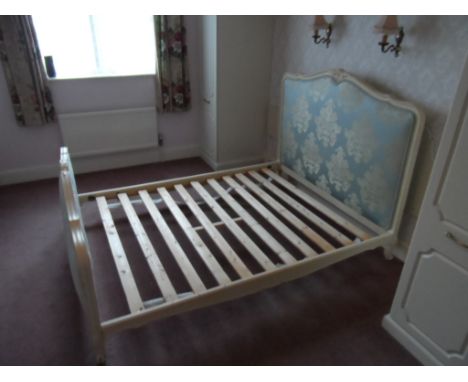 French upholstered double bed frame. Cream painted frame with eau de nil fabric. NOTE: This item is not on view but is in ext