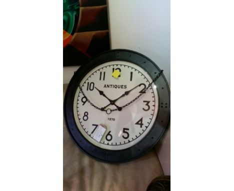Very large repro railway station clock, approx 80 cm diameter. Chain supplied for hanging *this item will have VAT added to t