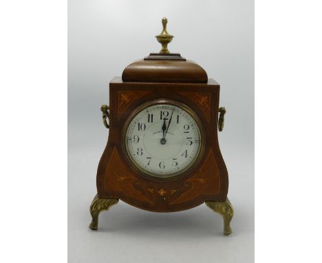 Inlaid mahogany Mantel Clock, by Walker &amp; Hall Ltd with French movement: raised on brass cabriole legs with brass top fin