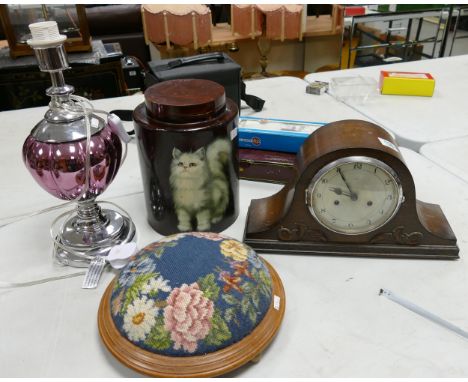 A mixed collection of items to include: Oak Mantle Clock, Chromed Lamp, Footstool &amp; Cat Theme lidded pot(4) 