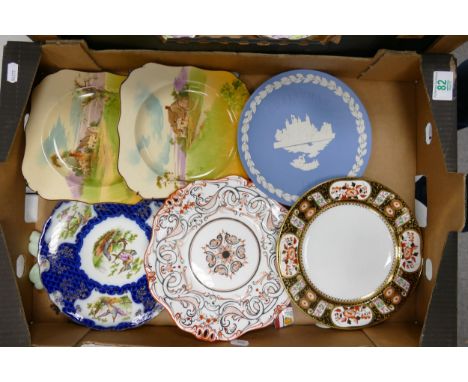 A mixed collection of decorative Rack Plates to include: Royal Doulton Seriesware, Wedgwood Christmas Plate, Imari Decorated 