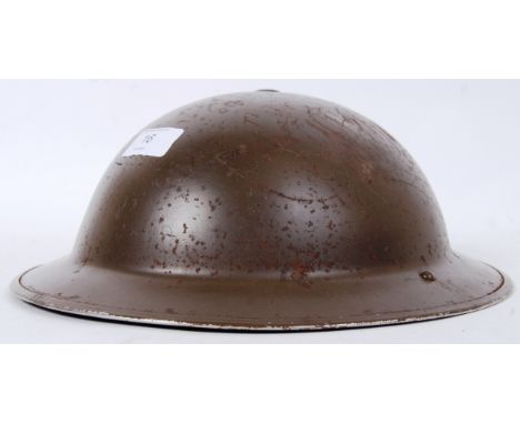 An original Second World War WWII British uniform helmet, c1939. With chin strap.  POSTAGE: Worldwide postage / delivery avai
