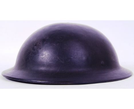 An original c1950's post WWII Civil Defense uniform helmet, made by Plasfort. With inner liner. POSTAGE: Worldwide postage / 