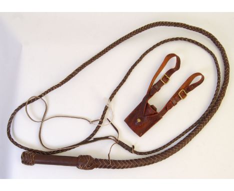 An original vintage Sam Brown sword frog with bull whip.  POSTAGE: Worldwide postage / delivery available on all items. Combi
