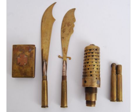 A collection of mostly WWI First World War Trench art and related pieces. To include a fuse, matchbox holder, letter openers,