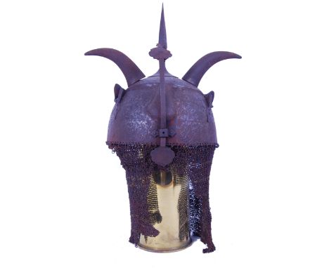 A 19th century Indo-Pursian Khula Khud embossed steel helmet. The bowl raised from a single sheet and embossed with a stylise