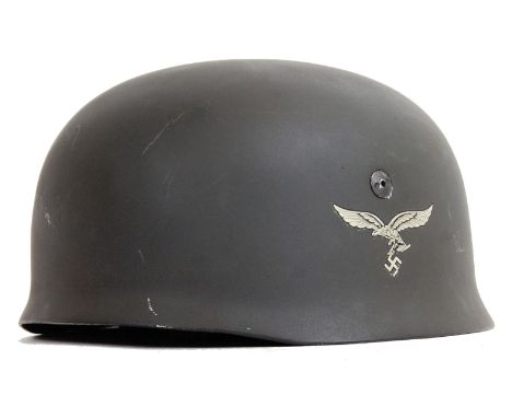 An original German WWII Third Reich Nazi Fallschirmjager uniform helmet (Paratrooper) helmet. Being repainted, with reproduct