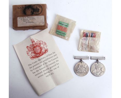 An original WWII Second World War medal pair to an LF ROberts or Wembley. WIthin the original box. With ribbons. POSTAGE: Wor