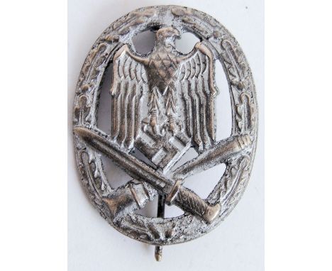 An original German WWII Second World War Nazi Third Reich General Assualt badge. Depicting the German eagle atop a bayonet an