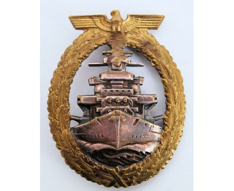 An original WWII Third Reich Second World War German made High Seas Kreigsmarine badge. White metal cruiser to centre, surmou