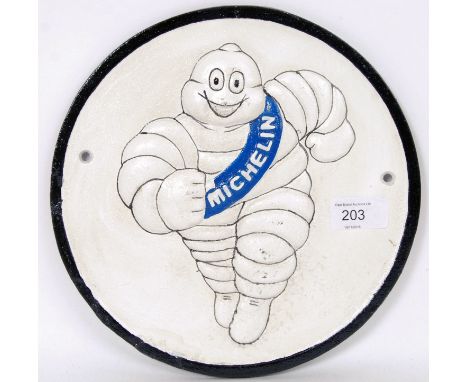 A vintage style, 20th century white wall plaque displaying the Michelin man running. 25cm long.&nbsp;&nbsp;POSTAGE: Worldwide