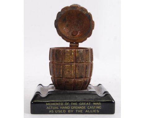 An unusual WWI First World War 'Memento Of The Great War Actual Hand Grenade Casting As Used By The Allies' match striker. Mo