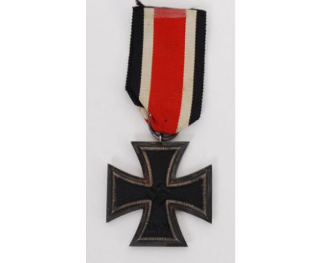 An original WWII Second World War Third Reich Iron Cross medal, with original ribbon. 1919 to one side, and 1813 to the other