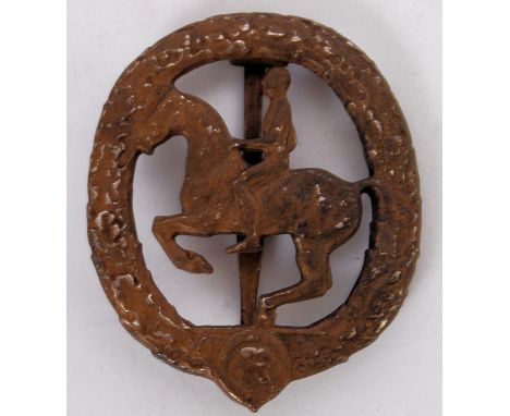 An original Second World War WWII Nazi Germany Third Reich horse riding sport badge. With R to the centre and makers marks fo
