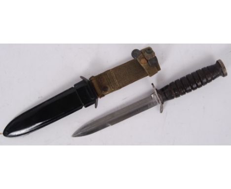 An original WWII Second World War US military army M3 UTICA combat knife with scabbard and frog.  POSTAGE: Worldwide postage 