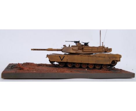 A likely Tamiya of Japan vintage model diorama of a tank driving through dinosaur remains. base 37x21.&nbsp;&nbsp;POSTAGE: Wo