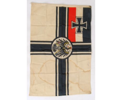 An original antique Imperial German flag. With the Prussian war colours to the top left panel, with Imperial German eagle to 