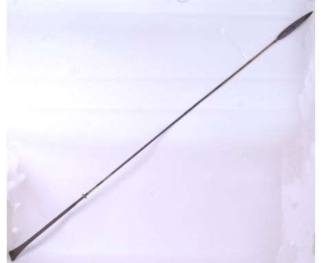 A rare and interesting believed 18th century brass banded Tuareg spear. Decorated brass bound shaft with shaped end piece. 17
