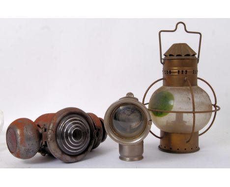 A collection of 3x assorted vintage lamps, comprising of a veteran car lamp, a Lucas car lamp and another in brass with handl