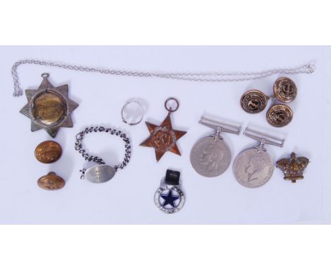 A Second World War / WWII medal trio belonging to an E R Barnett, along with a silver (marked 'sterling') identity bracelet m