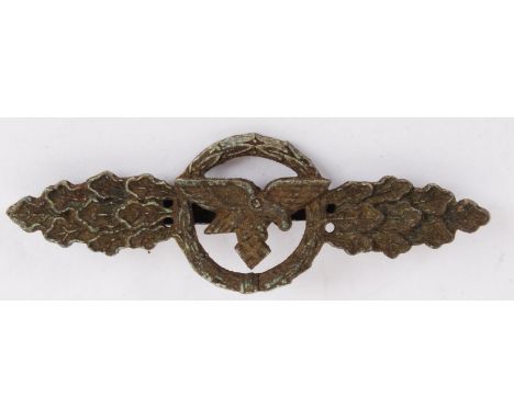 An original WWII Second World War Third Reich Nazi Luftwaffe Flight Jacket badge / brooch. Elongated laurel leaves with eagle
