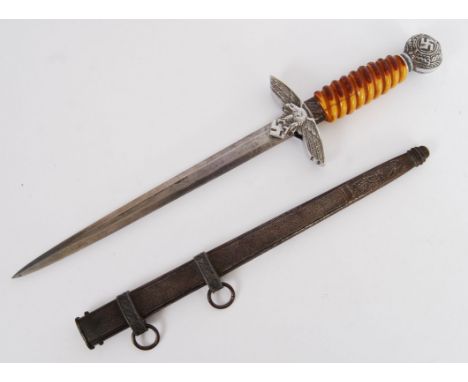 An original vintage WWII Second World War Nazi Third Reich officers dress dagger. Complete with original scabbard. The handle