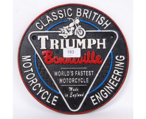 A vintage style, 20th century cast iron wall plaque promoting the Triumph Bonneville motorcycle. 25cm long.&nbsp;&nbsp;POSTAG
