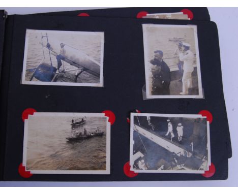 An interesting WWII Second World War album of personal photographs. Belonging to a crew member aboard HMS Hermes (sunk in Apr