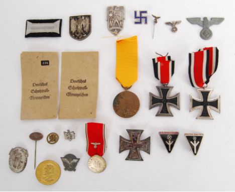 A group collection of assorted original WWII German / Third Reich medals and related badges etc. To include 2x Iron Cross med